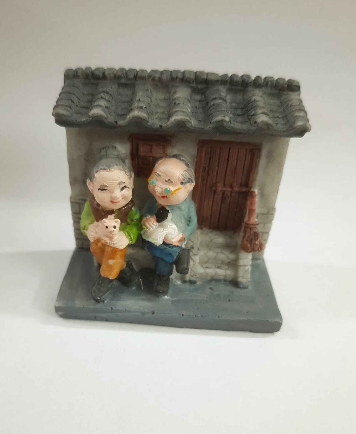 Old Couple Outside the House - Back Garden Nursery